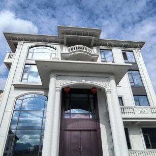 九江白麻别墅外墙干挂石材效果示例