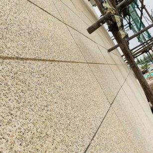 九江 黄金麻花岗岩荔枝面外墙干挂石材效果示例