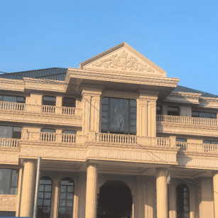 九江黄金麻别墅外墙干挂石材效果示例