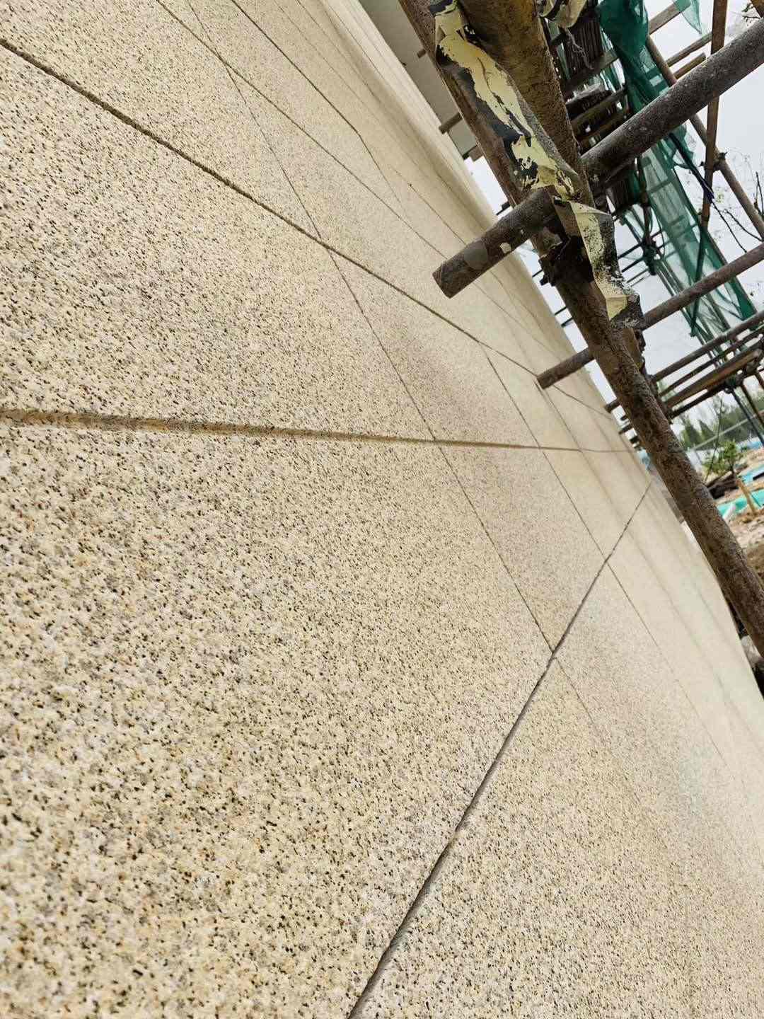 九江 黄金麻花岗岩荔枝面外墙干挂石材效果示例